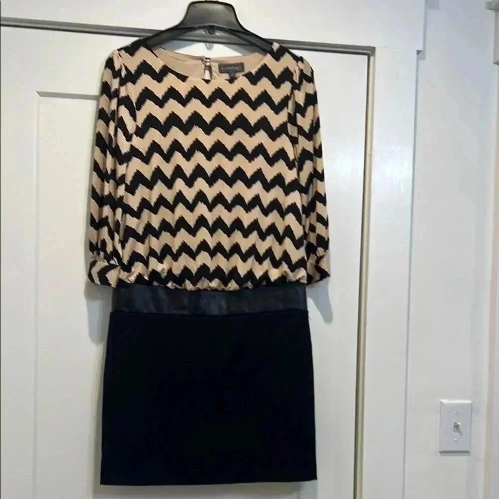 Luxology black and tan dress size 4. In perfect condition! NWT!